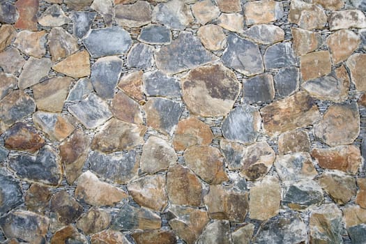 Close up image of a natural stone wall