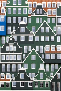 Square hotel-tower in local Zaanse architecture style