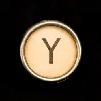 The Y button on a complete alphabet of an antique typewriter