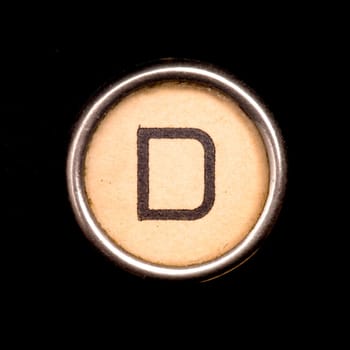 The D button on a complete alphabet of an antique typewriter