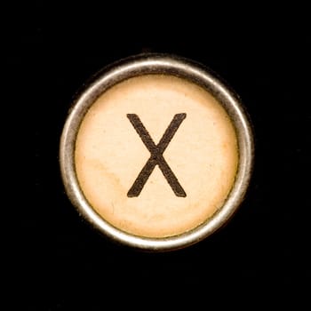 The X  button on a complete alphabet of an antique typewriter