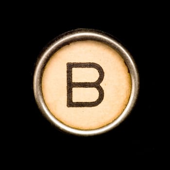 The B button on a complete alphabet of an antique typewriter
