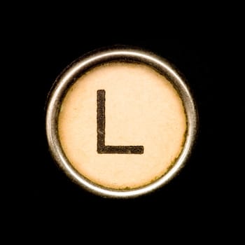 The L button on a complete alphabet of an antique typewriter