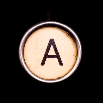 The A button on a complete alphabet of an antique typewriter