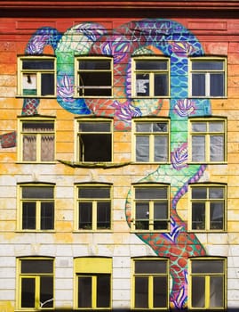 Facade of a squat building in Amsterdam, the Netherlands