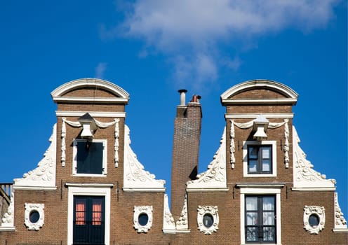Facade of canal houses in Amsterdam, the Netherlands