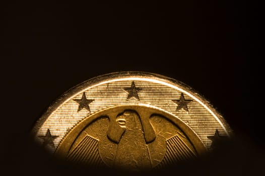 Coin of the European Union against a black background