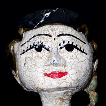 Antique indonesian puppet for sale in an antique shop