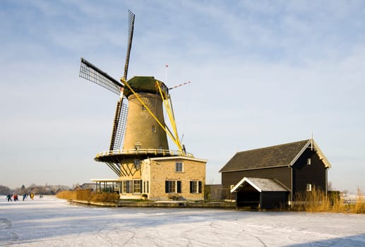 Dutch windmill in winter landscape, Bleskensgraaf, the Netherlands