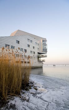 Sphinx apartments buildings in an ice landscape Huizen, the Netherlands