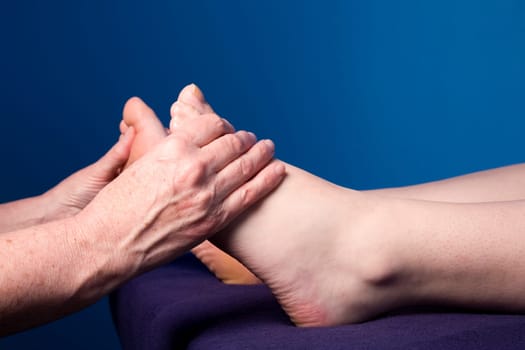 A young woman is getting a massage