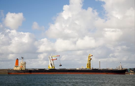Bulk carrier unloading in IJmuiden, the Netherlands