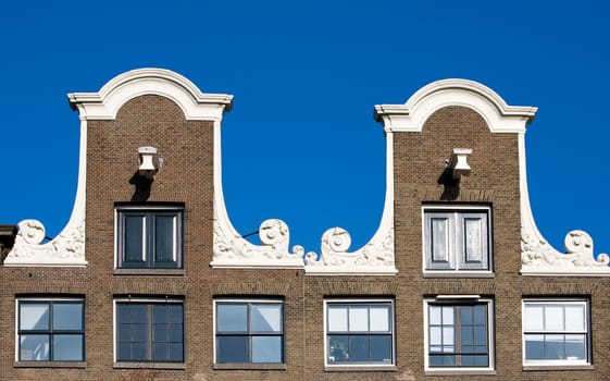 Façade of canal houses in Amsterdam, the Netherlands