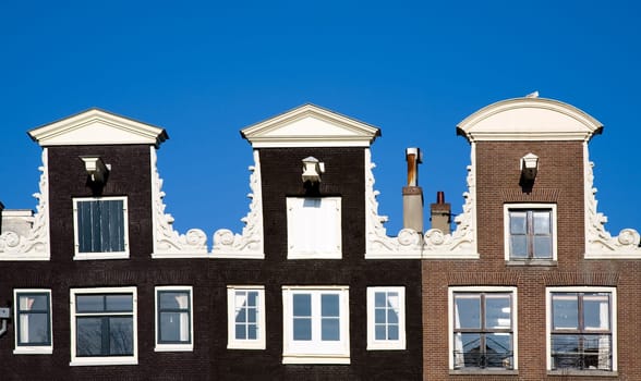 Façade of canal houses in Amsterdam, the Netherlands