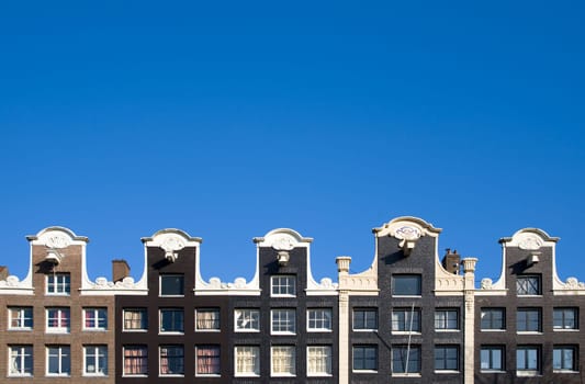 Façade of canal houses in Amsterdam, the Netherlands