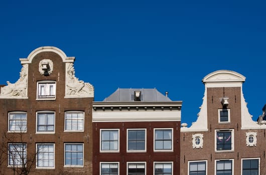 Façade of canal houses in Amsterdam, the Netherlands