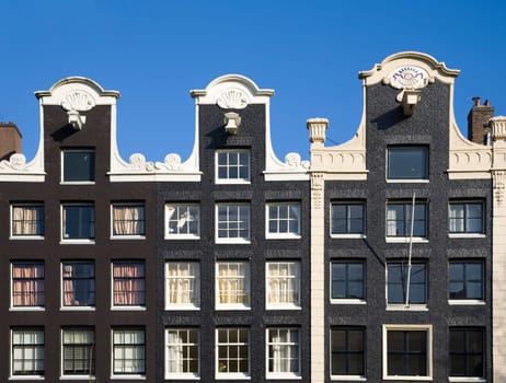 Façade of canal houses in Amsterdam, the Netherlands