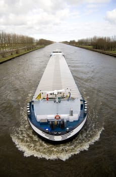 Inland navigation on the Amsterdam-Rijn canal in the Netherlands