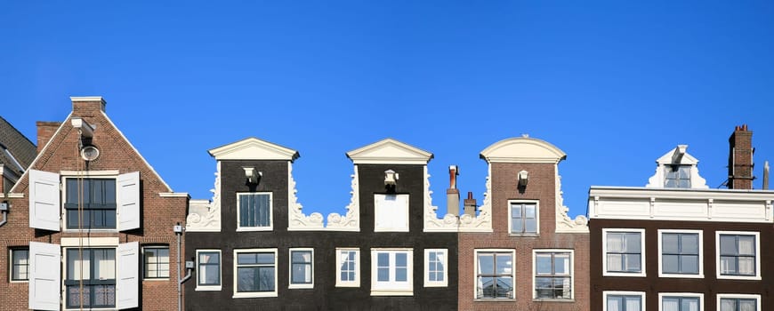 Façade of canal houses in Amsterdam, the Netherlands