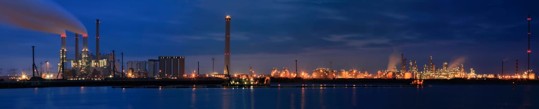 Panorama of a refinery at night at Europoort, Rotterdam, Holland