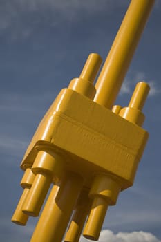Heavy duty nuts and bolts of a yellow bridge