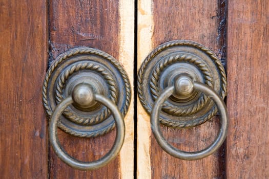 Door furniture on a Balinese door, Indonesia