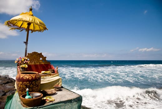 Balinese offering shrine at the ocean
