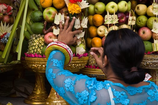 Preparing offerings for a temple ceremony in Bali