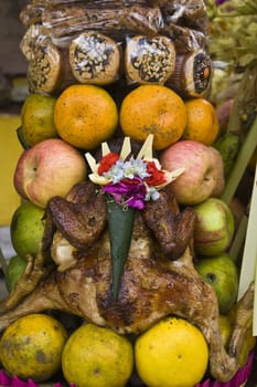 Preparing offerings for a temple ceremony in Bali