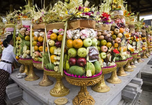Preparing offerings for a temple ceremony in Bali