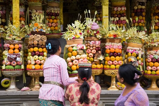 Preparing offerings for a temple ceremony in Bali