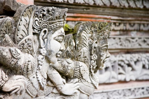 Traditional stone carving in a temple in Bali