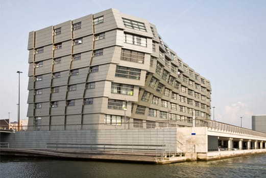 The wavy facade surface of a modern building in Almere, Holland