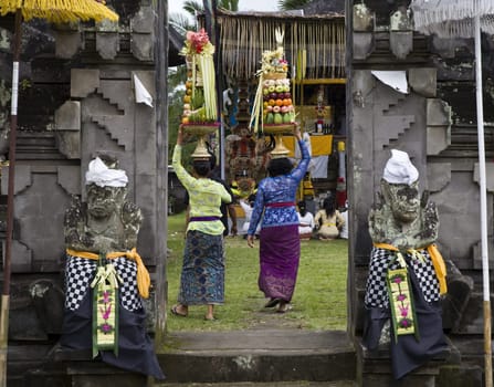 Preparing offerings for a temple ceremony in Bali