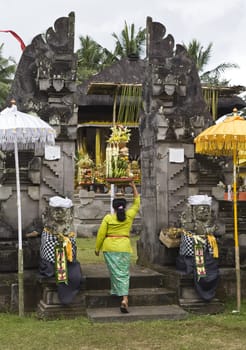 Preparing offerings for a temple ceremony in Bali