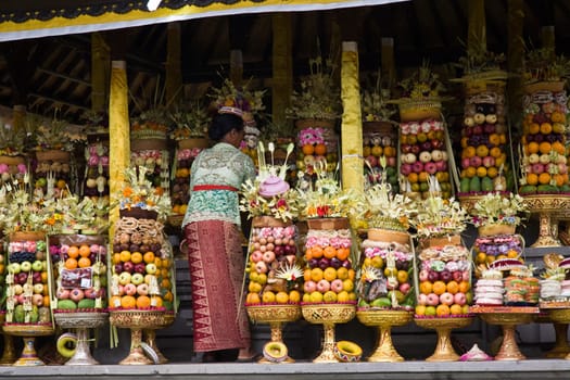 Preparing offerings for a temple ceremony in Bali