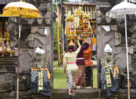 Preparing offerings for a temple ceremony in Bali