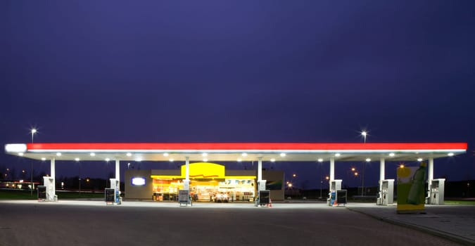 Empty gas station at night
