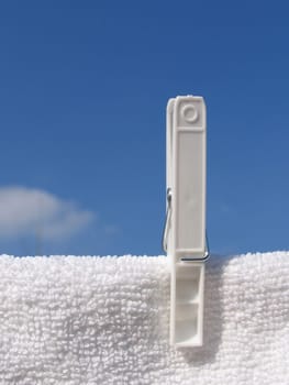 Clothes line against blue sky