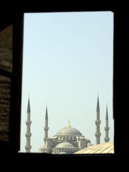 Look at the Blue mosque through a window from the Aya Sofya, Istanbul, Turkey