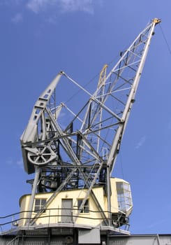 Historic crane in the harbor of Rotterdam, the Netherlands