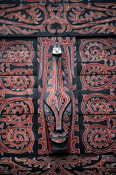 Traditional colorful and woodcarved Indonesian wall