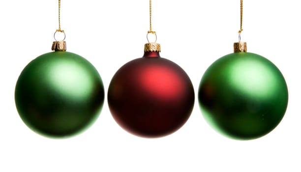 Three Christmas balls on a white background