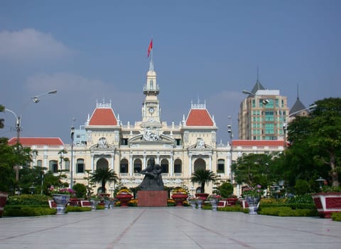 The People's Committee building in Ho Chi Minh City (Saigon) with in front the statue of Ho Chi Minh