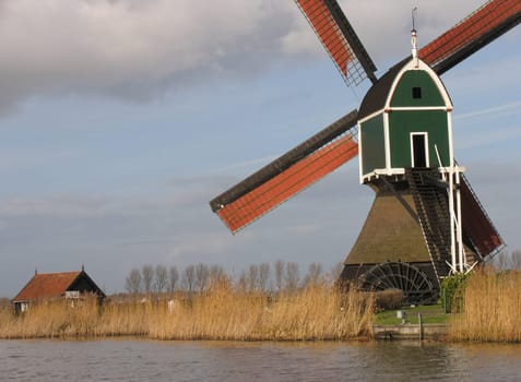 A Dutch windmill in Groot-Ammers, the Alblasserwaard, Holland