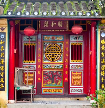 Colorful exterior of a Cantonese Assembly hall in Hoi An, Vietnam