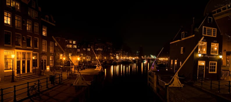 The "Oude Schans"" at night in Amsterdam, Holland"