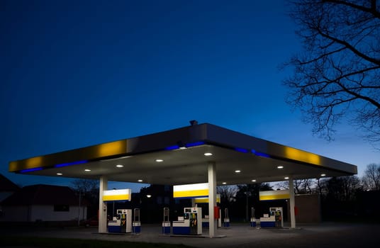 Empty gas station at night