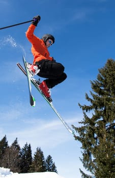 Skiers in the jump