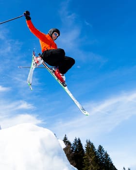Skiers in the jump